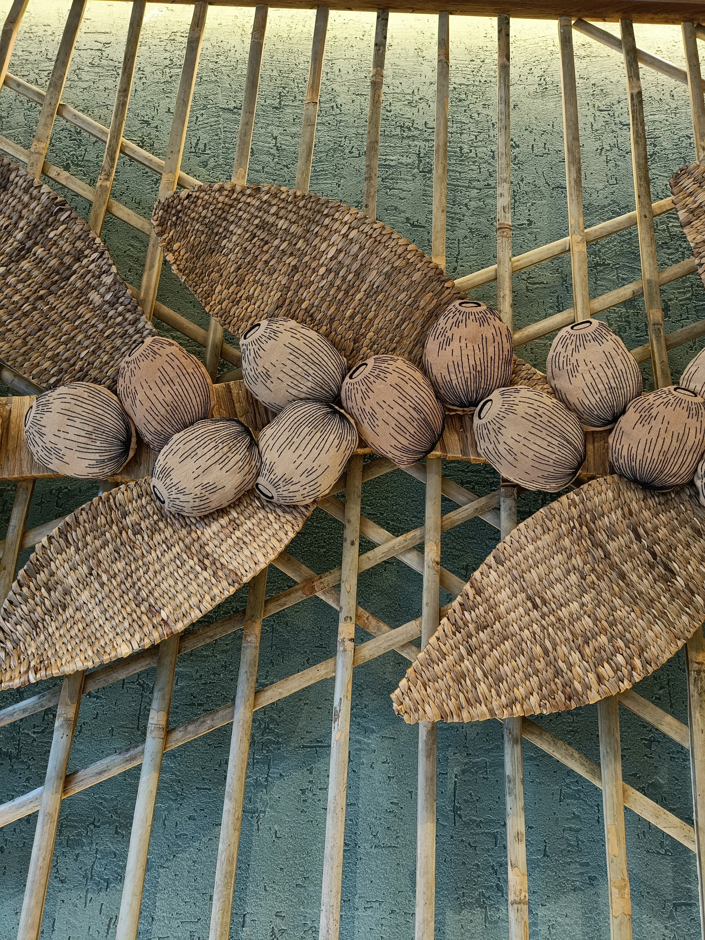Detail of the cane and meteka coffee-flower weave at Starbucks GS Road, Guwahati